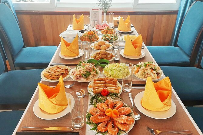 1 Day Tour to Halong Bay Cruise from 3 - 5 star Cruise & Transfer - Titop Island for the Swim-and-Photo Break (and a Possible Fee)