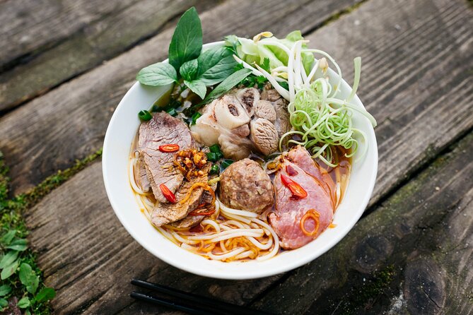 12 Tasting Street Food & Sightseeing By Scooter with Student - Pickup, Mobile Ticket, and How the Scooter Part Feels