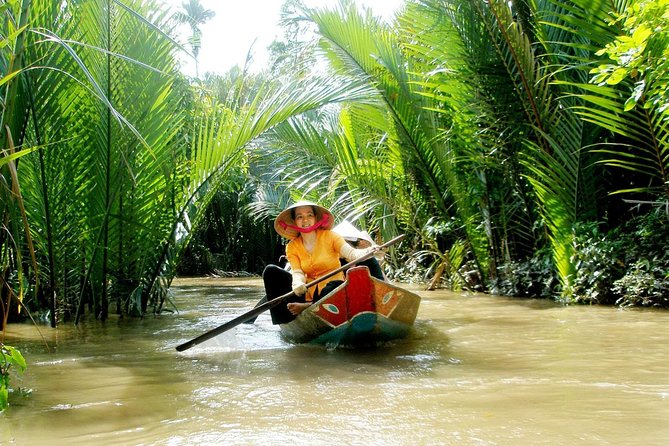 2-Day Mekong Delta Tour with Homestay - Thanh Thuy coconut garden stops: candy, honeybee tea, and fruit tastes