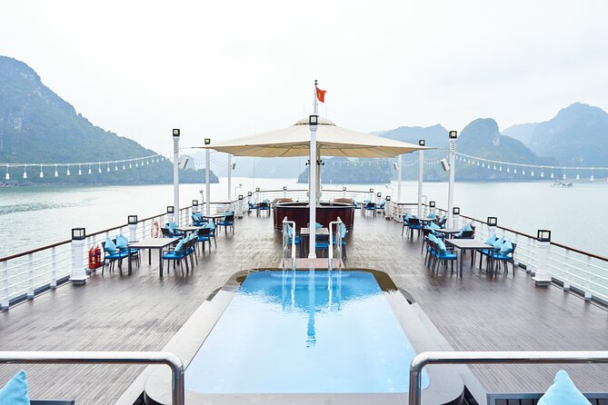 2-Day on 5-star Cruise, Lan Ha Bay | Kayak, Cycling, Live Music - Day 2: Tai Chi on the sundeck, breakfast, sunrise timing, and Dark & Bright cave