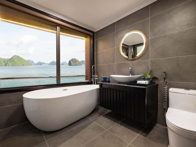 2-Day or 3-Day: Halong&Lan Ha Bay Cruise 5<em> balcony, bathtub – Quick hits to know’ /></p>
<ul>
<li><strong>Balcony and bathtub cabin comfort</strong> so you can cool off after active days</li>
<li><strong>Tra Bau water time</strong> with kayaking and swimming in a scenic bay area</li>
<li><strong>Chef-led Vietnamese cooking practice</strong> where you learn dishes like spring rolls</li>
<li><strong>Viet Hai Village in the 3-day option</strong> by bicycle or electric car, plus a local home visit</li>
<li><strong>Dark & Bright Cave</strong> by kayak or bamboo boat rowed by locals</li>
<li><strong>On-board entertainment</strong> like sunset parties, squid fishing, karaoke, and massage service</li>
</ul>
<h2 id="why-lan-ha-bay-feels-different-than-the-classic-halong-postcard">Why Lan Ha Bay feels different than the classic Halong postcard</h2>
<p><img width="820" height="615" decoding="async" src=