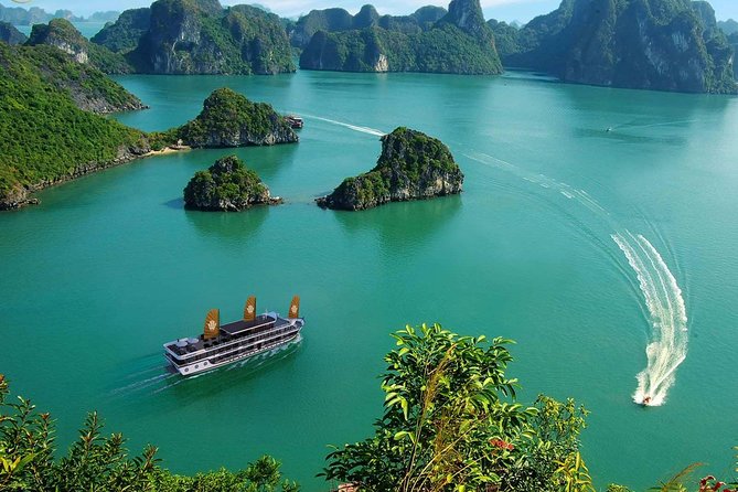 2 Days and 1 Night Halong Bay Luxury Genesis Regal Cruises - Sunrise moments, cooking class, and squid at sunset