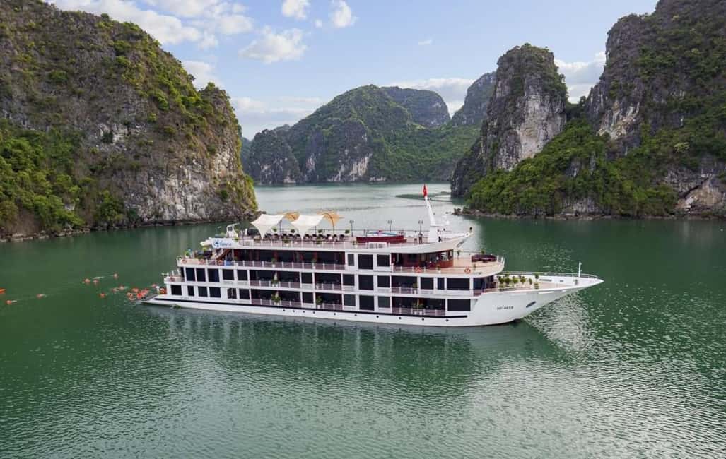2 Days Halong 5 Stars Cruise with Free Pickup from Hanoi - Day 1 in Halong: Dark and Bright cave at night, kayaking, and real swimming time