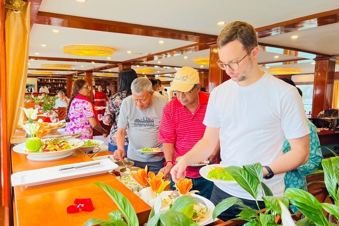 2D1N Ha Long Bay by Calypso Cruise, Caves, Meals, Transfer - Titop Island and Beach Time: Panoramic Views Plus a Real Swim Moment