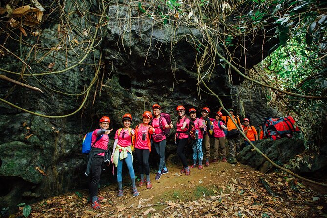 Abandoned Valley Adventure - E Cave & Golden Cave - 1D - E Cave: turquoise water, helmet gear, and optional on-water sports