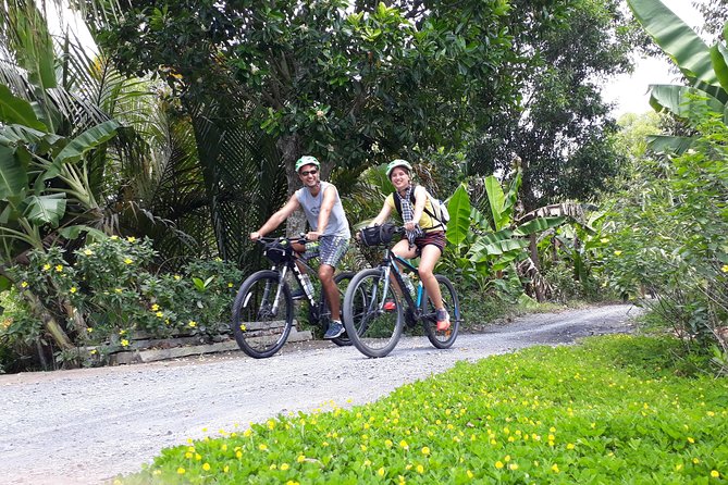 Adventure awaits – Two days Mekong Outdoor Activities. - Mekong Lodge area: peaceful villages, river bank riding, and ferries