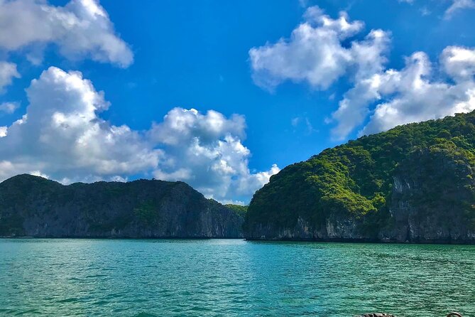 Amazing day - Boat trip discover real Ha Long Bay and Lan Ha Bay - Moving into Ha Long Bay UNESCO waters: fewer tourists, Dark and Bright Cave kayaking