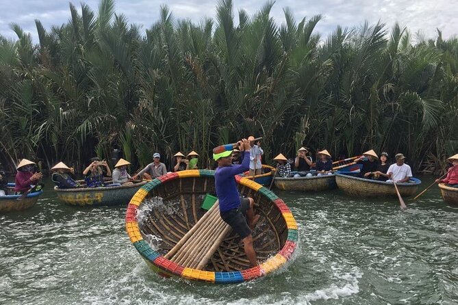Basket Boat in Hoi An( visit water coconut forest,Crab fishing ) - Life jacket, rain gear, and umbrellas: comfort matters on the water