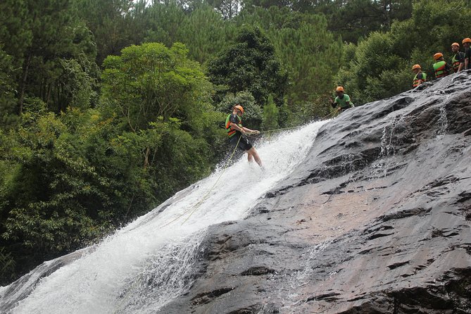 Canyoning Da Lat Vietnam - Water sliding and the 25m waterfall: where the route turns wild