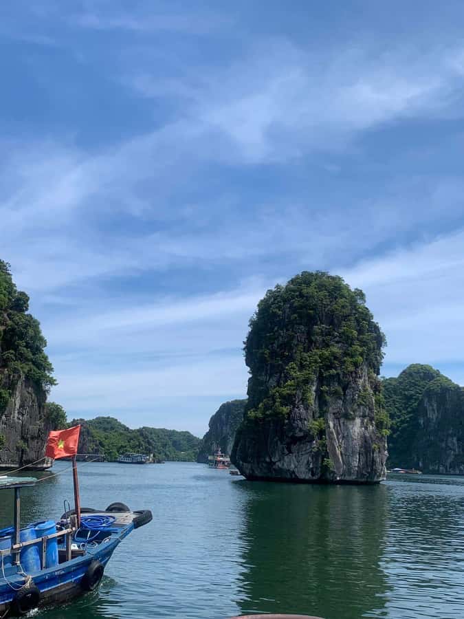 Cat Ba: Lan Ha and Ha Long Bay Boat Tour with Kayaking, Cave - Cruising Lan Ha Bay: karst scenery plus Cai Beo floating village context