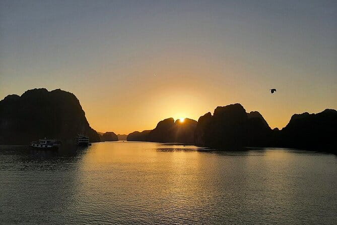 Cat Ba: Sunset & Bioluminescent Kayaking on Lan Ha Bay - Passing Cai Beo Floating Fishing Village: early views before dinner