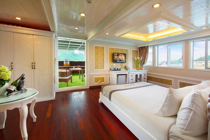 Charming Cruise 2-day Explore Halong Bay from Hanoi - Sunset anchoring: Happy Hour, canapés, dinner, and onboard shows