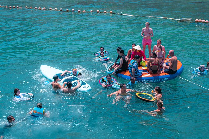 Coral Reef Snorkeling and Floating Bar Party from Nha Trang - Stop 2 at Nha Trang Beach: floating bar, unlimited drinks, and the slide
