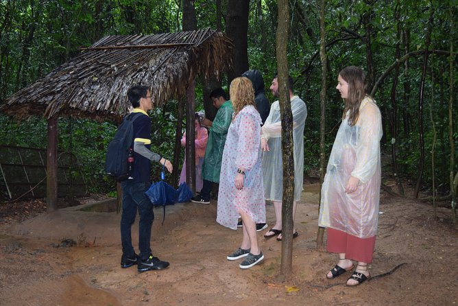 Cu Chi Tunnel Half Day Group Tour With Guide - Walking Through Cu Chi: What to Expect at the Main Stop