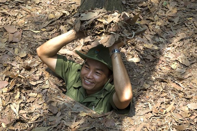 Cu Chi Tunnels Tour with LUNCH (Pho)-LESS TOURISTY-Max 7pax - Walking the tunnel grounds with a guide (and time on your own)
