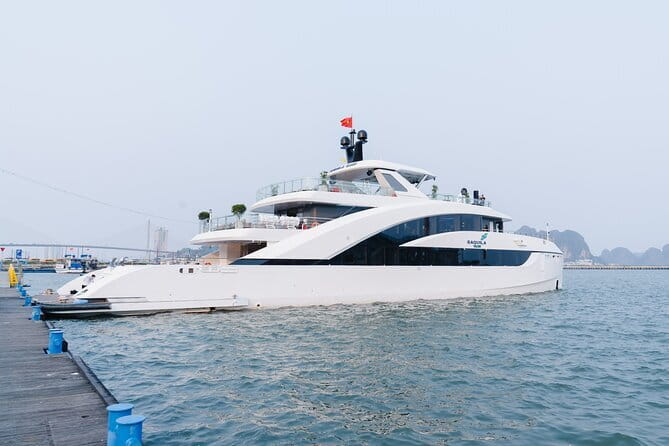 Day Trip - Luxury Experience in Ha Long Bay by Saquila Yacht - Welcome drinks, cold towels, and the onboard host