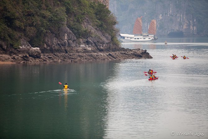 Deluxe Halong Bay 6 Hours Cruise To Visit Surprising Cave And Titop Island - Sunset party on the deck: photos, snacks, and a calmer finish