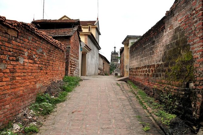 Duong Lam Ancient Village Private Tour: Ancient Vestage, Fortress - Duong Lam Ancient Village: laterite lanes, old houses, and a village gate feeling