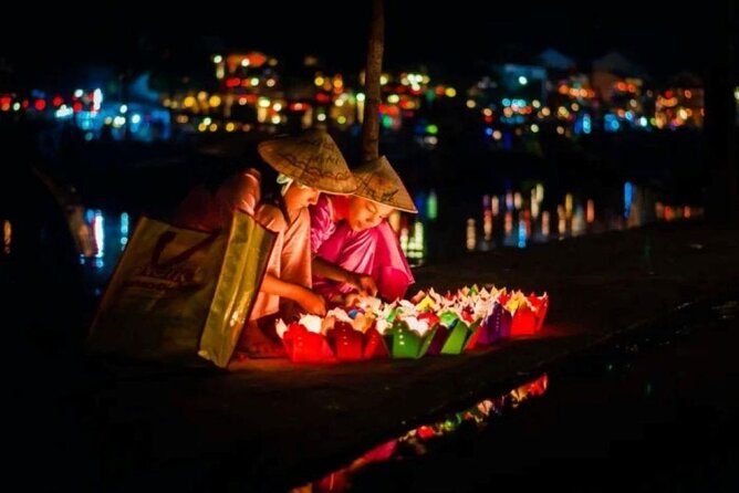 Experience Night Boat Trip and Floating Lantern on Hoai River - A quick wooden-boat glide that changes how Hoi An looks