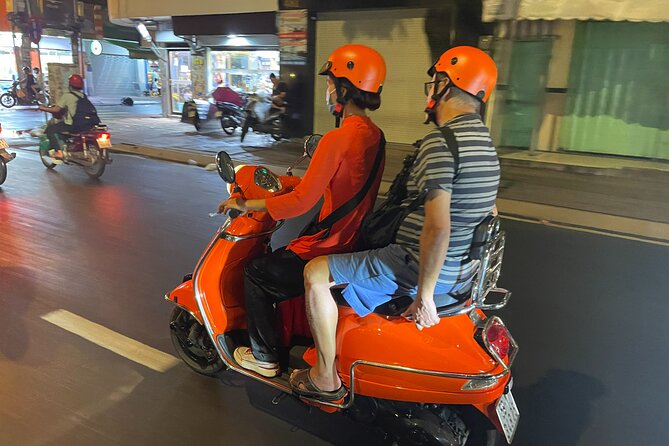 Female Riders Vespa Night Street Food + Train Street food 4 Hours - Stop 1 in the Old Quarter: your first street stall taste and night introduction