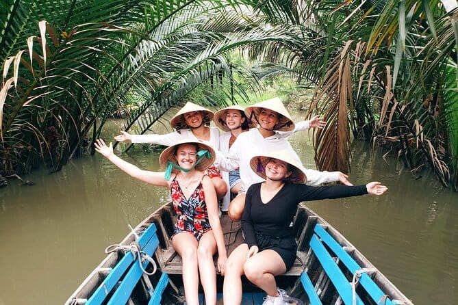 Floating Market & Hidden Canals – Small Group Morning Boat Tour - Cai Rang land market: fruit, snacks, and daily shopping