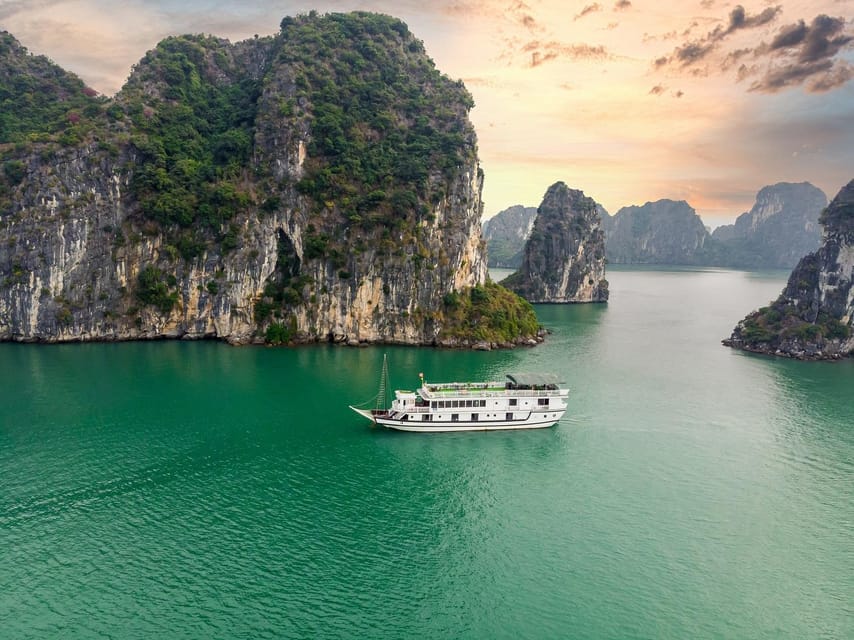 From Hanoi: 2-Day Ha Long Bay Boat Tour - Day 1 on Ha Long Bay: Sung Sot Cave and Titop Island