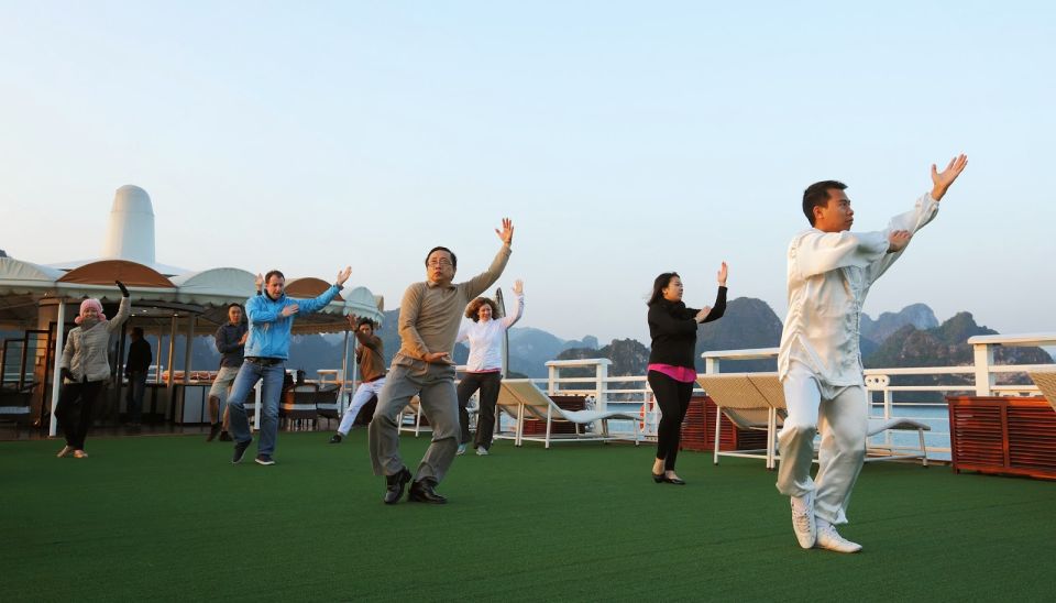 From Hanoi: 2-Day Halong Bay Cruise with Meals and Kayaking - Day 2: Tai Chi at Sunrise and Sung Sot Cave Inside-View Magic