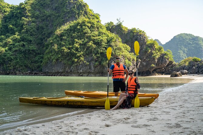 From Hanoi: 2D1N Ha Long Bay Deluxe Cruise with Bus Limousine - Day 2: Sung Sot Cave, Pearl Farm, and Kayaking Your Own Way