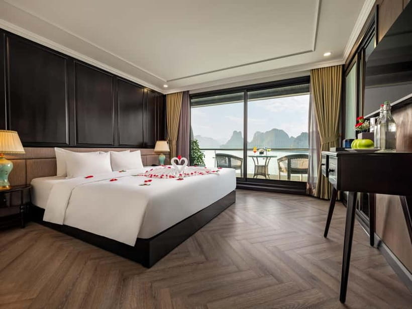 From Hanoi: 5-Star Cruise 2 Days 1 Night Ha Long &Lan Ha Bay - Day 1 in Plain Terms: Hanoi Pickup, Tuan Chau Check-In, Cave Kayaking, and Sunset Party