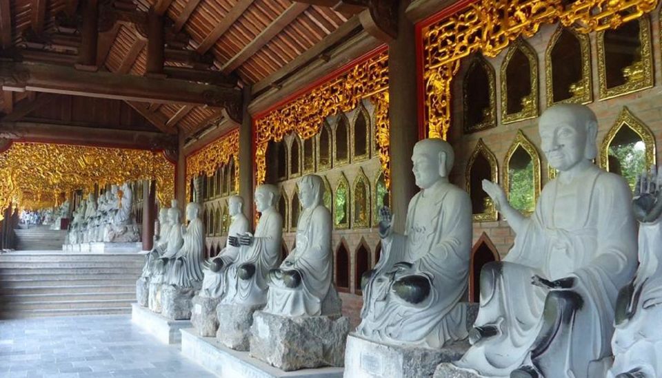 From Hanoi: Bai Dinh, Trang An, and Mua Cave Full-Day Tour - Trang An Boat Ride: Cave Scenery, Shrines, and Conical-Hat Photos