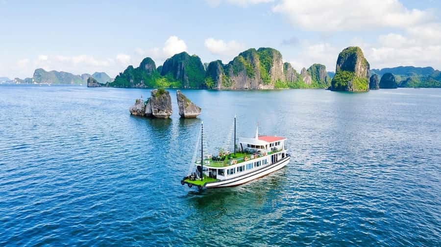 From Hanoi: Ha Long Bay Luxury Day Cruise with Food & Kayak - From Hanoi Old Quarter to Tuan Chau: the Day Starts Smooth