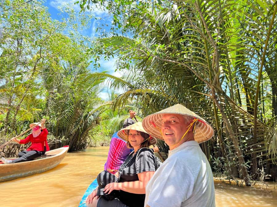 From HCM City: Cu Chi Tunnels and Mekong Delta Full-Day Tour - Rowing the Mekong: slow water, real routines