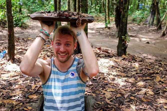 From HCM: Cu Chi Tunnels & Highlights City Full-Day Tour - Cu Chi Tunnels: Over 220 km of War Strategy and Survival