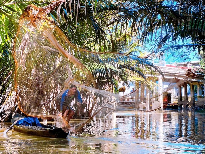 From Ho Chi Minh: Explore Mekong Delta & Vinh Trang Pagoda - Python farm: adventure photos with a comfort check