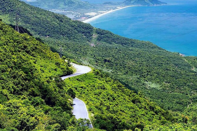 From Hue: sightseeing transfer to Hoi An with An Bang Cemetery - Lap An Lagoon and Lang Co Beach: calm water, classic coastline