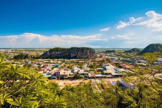From Hue: sightseeing transfer to Hoi An with An Bang Cemetery - Marble Mountain on the way into Hoi An: caves, pagodas, and high ground