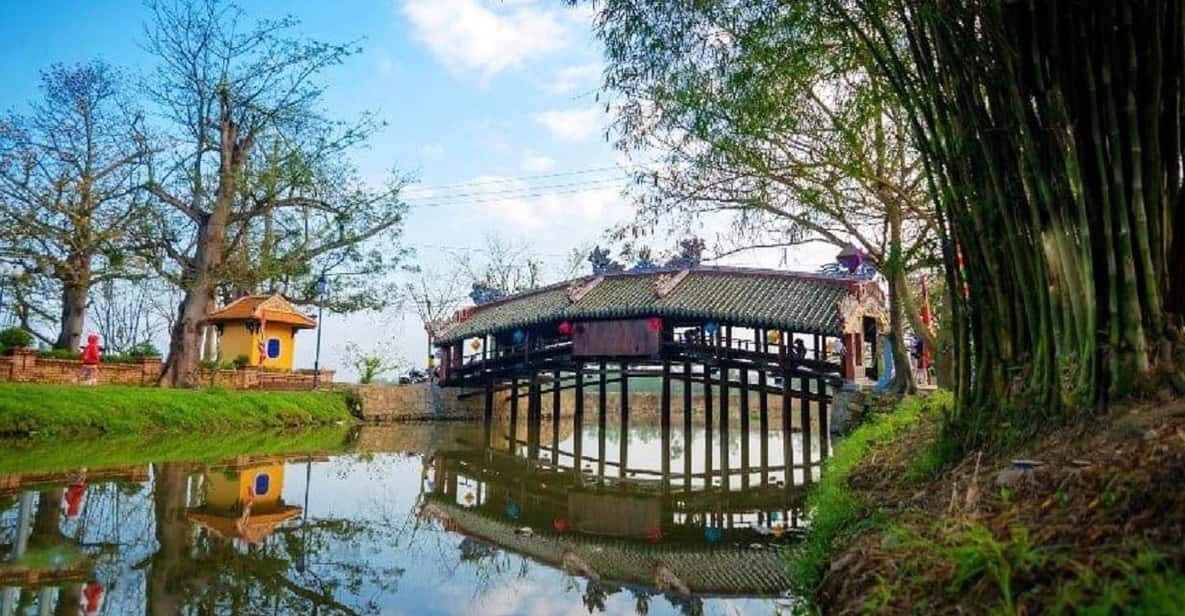 From Hue : Transfer Hue To Hoi An with Sightseeing Stops - Stop 1: Thanh Toan Tiles-Roofed Bridge and the everyday countryside vibe