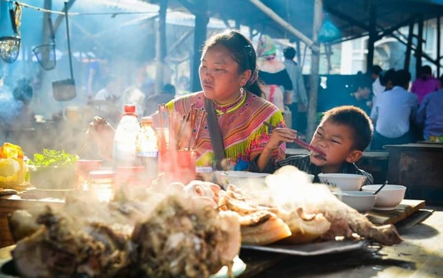 From Sa Pa: Sunday Bac Ha Market Group Tour - Tea farm + Ha Khau border gate: a day that moves beyond Sapa town