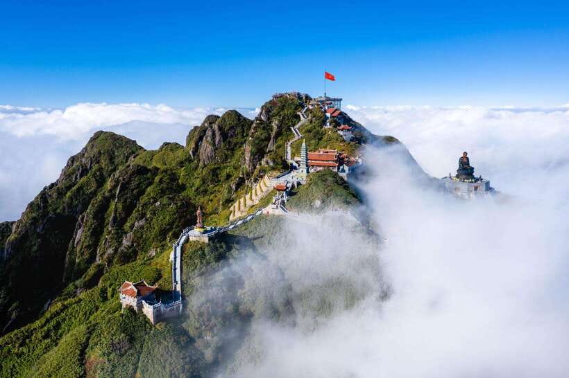From Sapa:Cable Car Ticket To Fansipan Legend & Car Transfer - Guanyin on Fansipan: the 12m bronze start that sets the tone