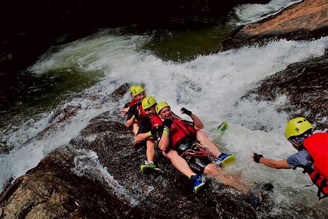 Full Day Canyoning Activity in Da Lat with Lunch - First Ropes: The 18-Meter Dry Abseil at the Start