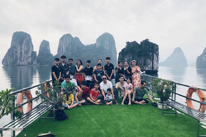 Ha Long Bay 1 Day 6 hour-Cruise with kayaking, Cave visiting & Swimming - Titop Island (About 1 Hour): Swim, Sun, and a Short Trek