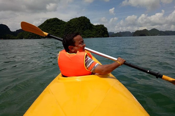 Ha Long Bay Six Hours Trip Kayaking & Swimming on Beach - Luon Cave kayaking vs bamboo boat: choose your effort level