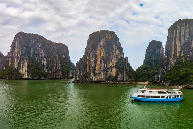 Ha Long Bay Six Hours Trip Kayaking & Swimming on Beach - The viewpoint climb: short hike, big payoff
