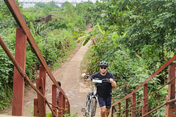 Half Day Ha Noi Tour by E-bike - West Lake first: a smart start for orientation and flow