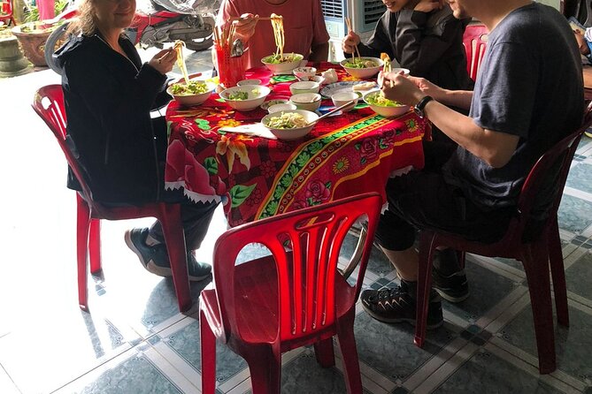 Half-day Hoi An Countryside Bike Tour and Basket Boat with Lunch - Lunch prep at Lò Mì Quảng Bà Tiễn: noodles and Banh Dap like a family