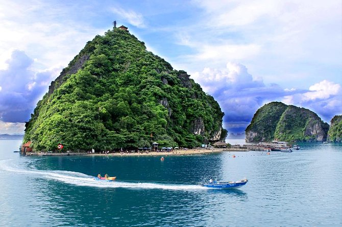 Halong 6 hours Boat tour with Cave, Kayak, lunch, transfer high-way from Hanoi - First on the Water: Lunch Starts Early and You’ll See the Iconic Rock