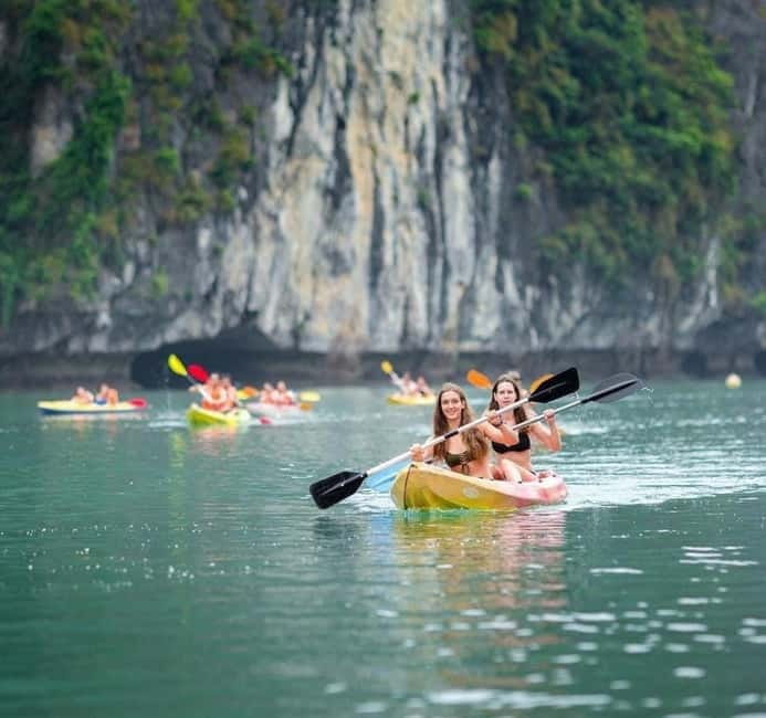 Halong 6 Hours Cruise: Kayak, Cave, Lunch, Beach & Island - Luon Cave by Kayak: Paddling Through Limestone Calm
