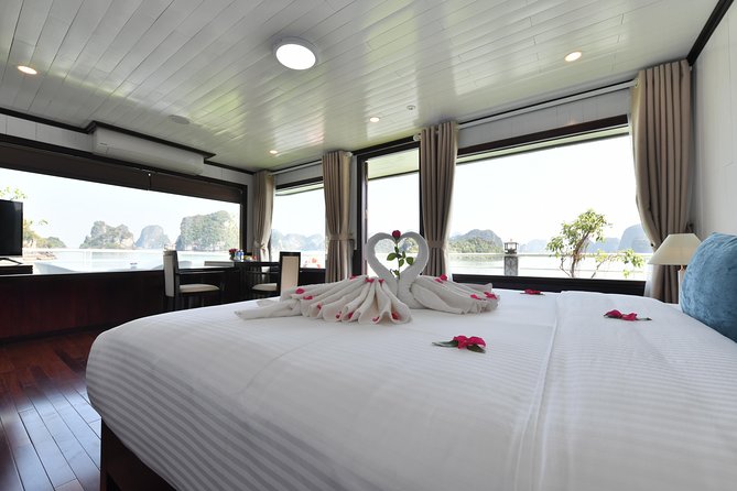 Halong Bay 2 Days 1 Night Included Transfer from Hanoi - Day 1 on the Bay: Surprising Cave and Ti Top Island Stops