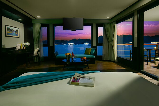 Halong Bay 3 days 2 nights on PEONY CRUISES 5 Stars LUXURY - Day 2: Tai chi sunrise, Viet Hai village e-carts or bikes, and a quiet lagoon swim
