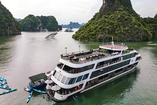 Halong Bay Cruises 5 Star for 2Days/1Night All included - Day 2 sunrise routine: Tai Chi, Dark & Bright Cave, and calm water magic